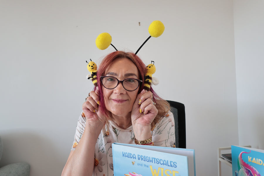 Children's author Xanda Monteiro wearing bee antennae
